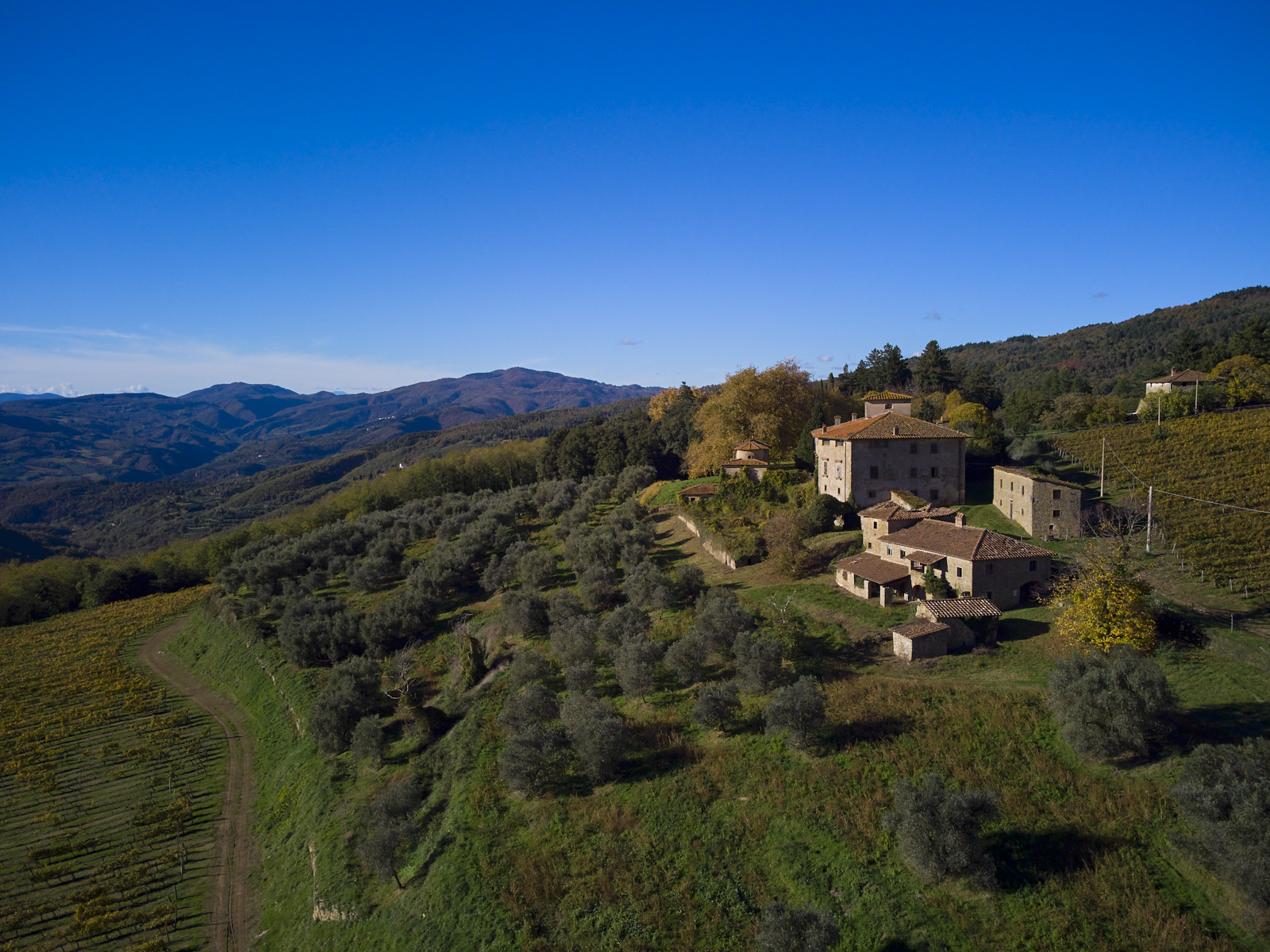Aerial estate view with hills